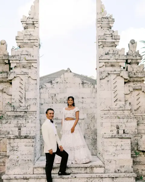 A couple at a Balinese temple gate