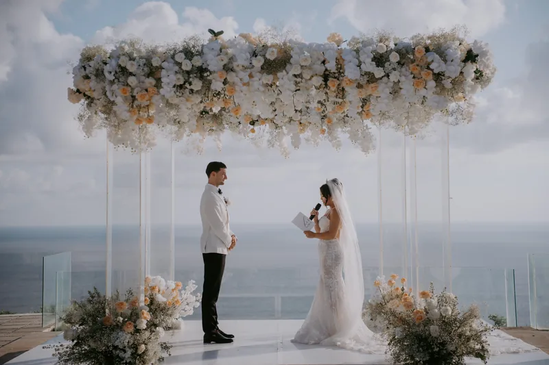 Vows beneath a floral canopy, Villa Plenilunio